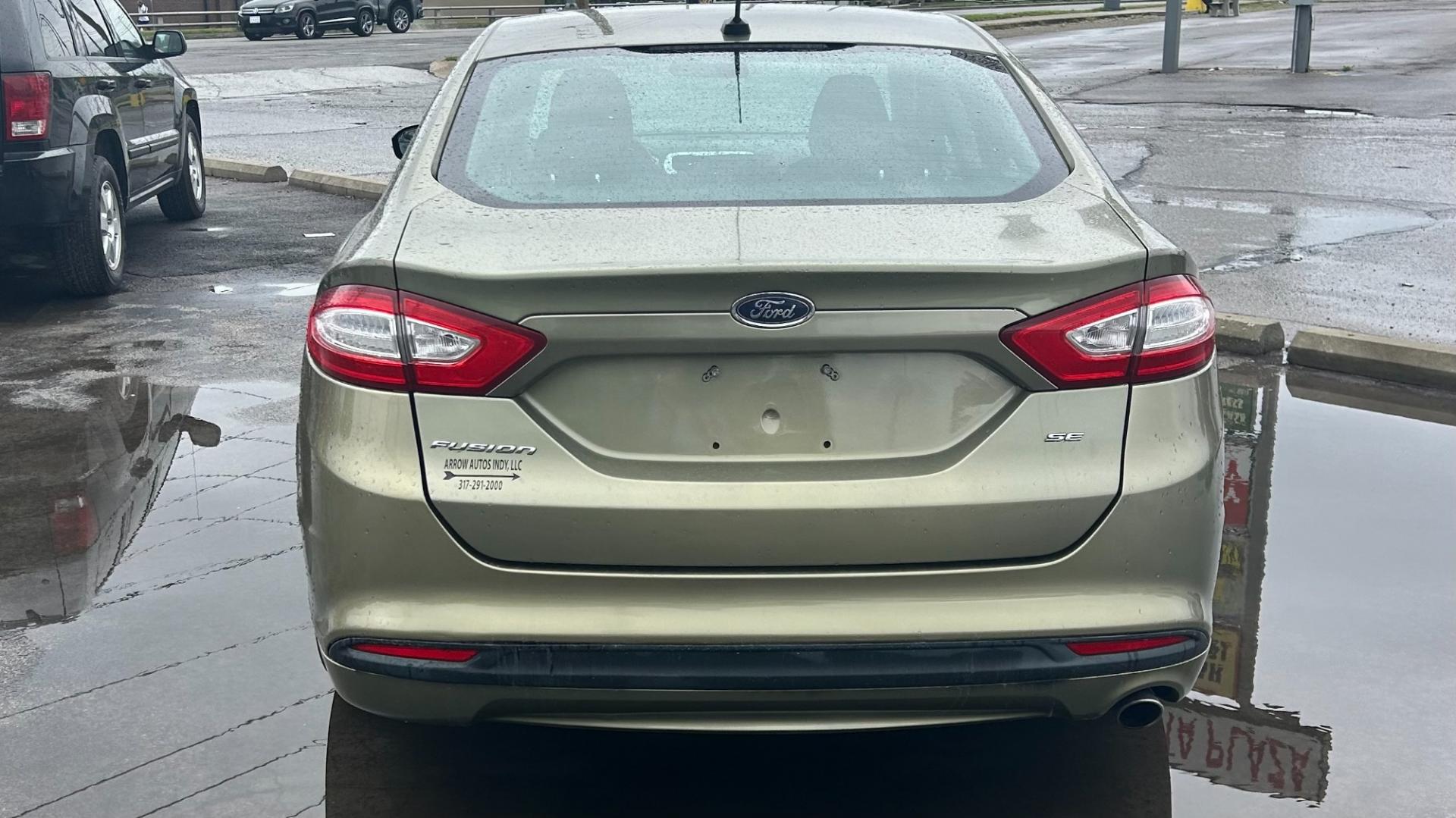 2013 GREEN /Black Ford Fusion (3FA6P0H73DR) , located at 2710A Westlane Rd., Indianapolis, IN, 46268, (317) 291-2000, 39.885670, -86.208160 - Photo#3